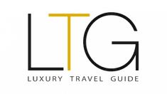 the luxury travel guide logo is shown in black and yellow, on a white background