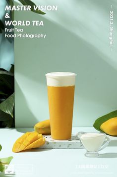 an advertisement for a tea shop with mangos and a cup on the table next to it