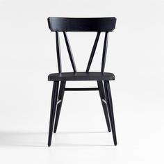 a black wooden chair on a white background with the seat up and back turned down