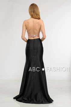 Sparkle and shine in this two-piece gown with sequined crop top by Poly USA 8294. Gorgeous two-piece dress with sequins halter V-neck crop top secured by a sheer illusion panel, mermaid silhouette span satin black skirt, and a back zipper closure. Affordably priced under $170, this dress is perfect for any formal event and will keep you on budget! Designer: Poly USA Style Number: 8294 Material: Sequins, Span Satin, 100% Polyester Details: Bra Cup, Fully Lined Fit: The model is 5'9" Colors: Rose Fitted Two-piece Dress For Prom Season, Fitted Satin Skirt For Prom, Fitted Two-piece Dress For Prom, Fitted Two-piece Evening Dress For Prom, Fitted Sequin Skirt For Prom, Fitted Evening Skirt For Prom Season, Fitted Two-piece Dress For Prom Evening, Fitted Two-piece Dress For Evening Prom, Fitted Skirt For Evening And Prom Season