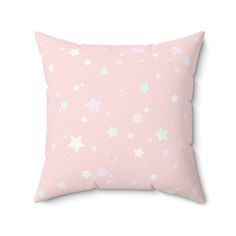 a pink pillow with stars on it