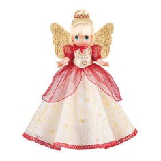 a little angel doll wearing a red and white dress with gold trimmings on it's wings