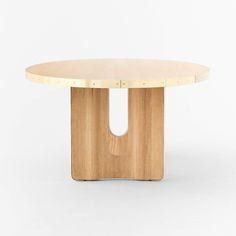 a wooden table with an oval shaped base