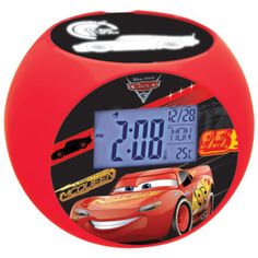 the digital alarm clock is red and has cars around it's face on display