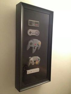 an image of a video game case on the wall with remotes attached to it