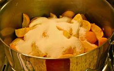 a pot filled with food sitting on top of a stove