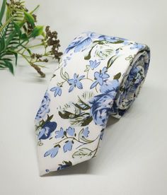 Dusty Blue Floral Tie, Floral Tie, Groomsmen Tie, Blue Rose Tie, Wedding Tie, Dusty Blue Tie Blue Floral Tie, Gifts for Him, Mens Ties - Etsy Blue Summer Wedding Ties, Blue Suit And Tie Accessories For Wedding, Dapper Blue Wedding Ties, Blue Floral Print Tie As Gift, Blue Suit And Tie Accessories For Groom, Adjustable Blue Floral Print Tie, Dapper Blue Ties For Groom, Blue Wedding Suit And Tie Accessories, Blue Wedding Ties