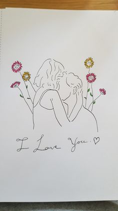 a drawing of two people hugging each other with flowers in front of them and the words i love you written on it