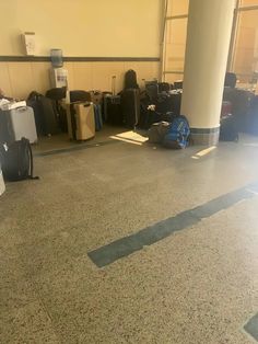 there are many suitcases and bags in the airport