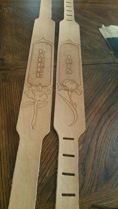 two pieces of cardboard with flowers on them