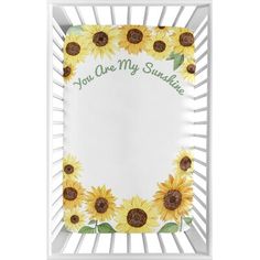 the sunflowers are on the side of this white frame with you are my sunshine written in green