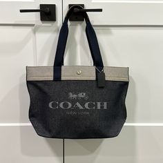 Coach Denim Tote With Snap Closure And An Inside Zipper Pocket Handle Drop 10” H 12” X W 18 Coach Denim, Coach Fashion, Horse And Carriage, Coach New York, Coach Tote, Bags Coach, Denim Tote, Online Workouts, Vintage Coach