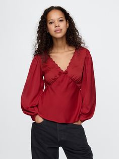 Soft satin top.  Lace-trim V-neck.  Long sleeves.  Empire waist.  Fit: Classic.  A straight & easy fit.  Hits at the hip.  Models wearing Gap Cotton Wrap Top, Pretty Long Sleeve Tops, Artist Attire, Wrap Top Outfit, Silk Tops For Women, Flowy Fashion, Fall Blouses, Empire Top, Empire Waist Top