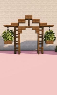 a small wooden structure with plants growing out of it's sides on a pink surface