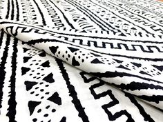 a black and white pattern on a table cloth