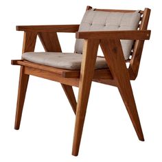 a wooden chair with a cushion on it