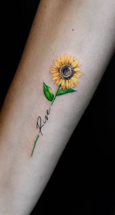 a yellow sunflower with the word love written in cursive writing on it