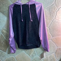 Black And Purple Hoodie With No Pocket. The Purple Is Velvet On The Sleeves. Black Is Very Soft And Stretchy Material. Never Worn. Tags Still On It! Purple Long Sleeve Sweater For Streetwear, Trendy Purple Sweater For Streetwear, Fall Purple Hoodie With Drawstring Hood, Trendy Purple Hooded Sweatshirt, Trendy Hooded Purple Sweatshirt, Trendy Purple Long Sleeve Hoodie, Casual Purple Hooded Sweater, Casual Hooded Purple Sweater, Trendy Purple Hoodie With Drawstring