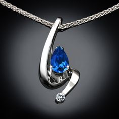 "Blue sapphire and white sapphire necklace in Argentium silver - 3380 - Argentium chain Included. A contemporary, yet timeless design by award winning designer, David Worcester. Ready to ship! ( IMPORTANT - PLEASE READ 1. AND 2 BELOW ) 1.) INCLUDED IN THE PRICE IS AN ARGENTIUM SILVER CHAIN APPROPRIATE FOR THE PENDANT CHOSEN. YOU CAN CHOOSE FROM 16\", 18\" OR 20\" LENGTH AT CHECKOUT. 2.) PLEASE LOOK AT THE MEASUREMENTS CAREFULLY. SOME PHOTOS HAVE BEEN ENLARGED TO SHOW DETAIL, WHILE OTHERS HAVE BE Jewellery Hangers, Swiss Blue Topaz Necklace, White Sapphire Necklace, Alexandrite Necklace, Yucca Valley, Blue Sapphire Pendant, Blue Sapphire Necklace, Fine Gold Jewelry, Blue Topaz Necklace