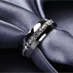 a couple of rings that are on top of a tie