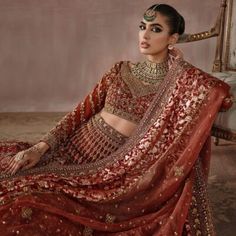 The luxurious Indian Bridal Maroon Lehenga Choli is an embodiment of custom and eminence that prevails upon everybody at the absolute first look with its appeal and tastefulness. Extravagance goldwork and hand-created embellishments make this wonderful Lehenga Dress your chief need for the mystical day.
For more details contact us on our WhatsApp 
+1 (732) 351-5426
Visit our website 
www.nameerabridal.com
#bridaldressonline #bridaloutfit #usabridalgown #usabridaldress #onlinebridaldress #pakista Bridal Choli, Maroon Lehenga, Beautiful Lehenga, Lehenga Dress, Gold Crystals, Indian Bride Outfits, Bridal Lehenga Choli