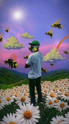 a man standing in the middle of a field of daisies with bees flying around