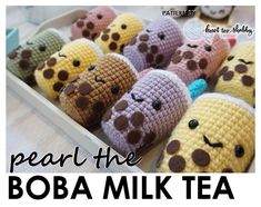 there are many crocheted stuffed animals in a box with the words pearl the boba tea on it