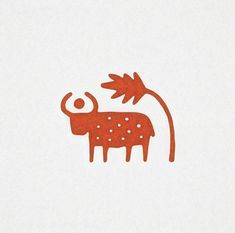 an orange cow standing next to a tall plant on a white background with red dots