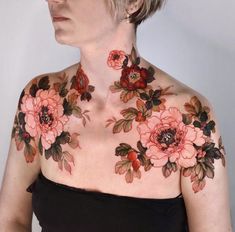 a woman with flowers painted on her chest