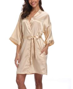 PRICES MAY VARY. Solid color satin robes for women with elegant oblique V-neck clear design. Made from quality satin fabric, lightweight, soft, comfy; Dear, you will feel like wearing an expensive silk robe. With 2 side pockets, belt loops and inside ties.Elegant yet sexy V neck short robes for women. Available in multiple colors and sizes, perfect for weddings, gifts, or everyday wear. Machine wash cold; Gentle cycle; Tumble dry low; Dry clean recommend. Women's Short Satin Kimono Robes Summer Bridal Party Dressing Gowns, Wedding Party Robes, Monogram Robes, Short Kimono Robe, Summer Loungewear, Satin Robes, Wedding Robes, Silky Robe, Embroidered Robes