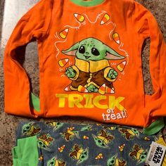 Mandalorian Grogu Childs Pajamas Nwt Long Sleeve Sleepwear For Halloween Playtime, Playful Orange Sleepwear For Sleepovers, Playful Orange Long Sleeve Sleepwear, Orange Long Sleeve Sleepwear For Fall, Halloween Costume Sets With Long Sleeves, Long Sleeve Halloween Costume Sets, Playful Orange Loungewear Sets, Orange Long Sleeve Halloween Sets, Playful Orange Playwear Sets