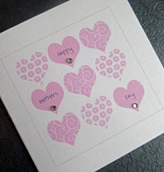 a card with pink hearts on it that says happy mother's day