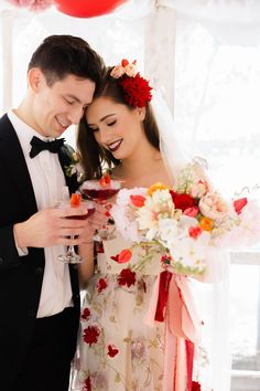 a bride and groom standing next to each other