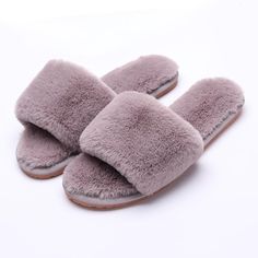 Who needs shoes anyway when you have these faux fur house slippers by Haute Edition? They stay secure on your feet all day long with the faux fur strap, and the padded footbed provides arch support for your feet. The rubber sole gives these traction in case you need to pop outside for a quick errand or to pick up a package. You'll love how warm the faux fur material feels on your feet. Faux fur upper Antiskid soles Easy slide on design Indoor or outdoor use FIND YOUR SIZE: Small - Size 5-6 Mediu Sport Shoes Outfit, Memory Foam Sandals, Mens Sandals Fashion, Cute Slides, Spa Slippers, Faux Fur Slides, Wedding Slippers, Slippers Boots, Faux Fur Material