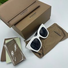 Authentic Brand New Condition. Burberry White Sunglasses Classic White Sunglasses For Everyday Use, Classic White Sunglasses For Everyday, White Square Frame Sunglasses For Beach, Chic White Square Frame Sunglasses, Elegant White Sunglasses For Everyday, Elegant White Everyday Sunglasses, Designer White Polarized Sunglasses, Designer White Sunglasses With Polarized Lenses, Elegant White Square Frame Sunglasses