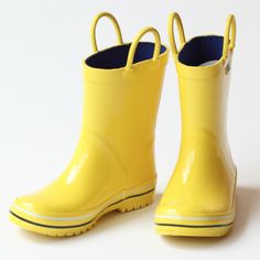 These rain boots for boys by Pluie Pluie come in a cheery yellow color and contrasting white and black trims for stylish measure. Your boy will not be able to resist and will readily go puddle jumping with this pair! Rubber upper Cotton lining for absorbing moisture Tread outsole for slip resistance Pull on handles for easy pulling on & off 6.25" shaft PVC-free Note: Sizes 5-13 (Toddler), 1-4 (Youth) Cheap Raincoats, Yellow Rain Boots, Boots For Boys, Cute Rain Boots, Puddle Jumping, Boys Rain Boots, Blue Raincoat, Kids Rain Boots, Yellow Raincoat