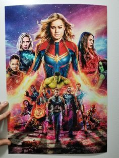 the poster for captain marvel 2 is shown in front of an image of many different characters