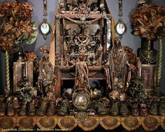 an ornate display with clocks and other items