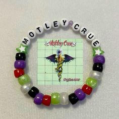 ((NOT MIND)) Kandi Bracelets Scene, Band Bracelet Ideas, Kandi Patterns Bracelets, Rave Bracelets, Pony Bead Bracelets, Diy Kandi, Motley Crüe