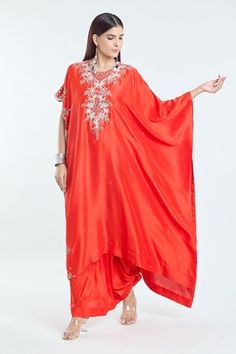 Red kaftan with contrasting floral, dori, cutdana and pearl embroidery. Comes with solid draped skirt. - Aza Fashions Red Silk Bollywood Kaftan, Elegant Red Designer Kaftan, Elegant Red Designer Wear Kaftan, Red Dabka Work Kaftan For Navratri, Navratri Red Kaftan With Dabka Work, Elegant Red Kaftan For Diwali, Festive Kaftan With Traditional Drape For Reception, Festive Reception Kaftan With Traditional Drape, Red Kaftan For Wedding And Navratri