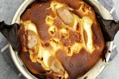 a close up of a cake in a pan on a table