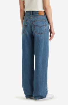 This take on '90s dad jeans is cut from nonstretch denim with extra-roomy wide legs that are meant to be worn stacked at the hem. 16" leg opening; 10 3/4" front rise; 15 1/2" back rise (size 29x32) Zip fly with button closure Five-pocket style 100% cotton Machine wash, tumble dry Imported Levi's Wide Leg Cotton Flare Jeans, Levi's Wide Leg Streetwear Bottoms, Levi's Wide Leg Bottoms For Streetwear, Levi's Wide Leg Denim Blue Bottoms, Levi's Medium Wash Wide Leg Pants, Levi's Wide Leg Medium Wash Pants, Levi's Retro Wide Leg Bottoms, Retro Levi's Wide Leg Bottoms, Retro Levi's Wide-leg Bottoms