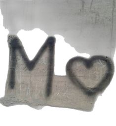 graffiti written on the side of a wall that says i love you in black and white