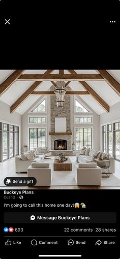 a living room filled with furniture and a fire place in the middle of a room