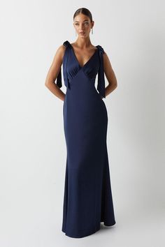 You name the occasion, we have the perfect dress. From maxi to mini and everything in between, find your dream dress to feel confident in. Choose classic shift dresses and flowing floor-length pieces for a timeless style, plus discover on-trend bardot and wrap dresses to wear on repeat. Style: Satin Back Crepe Tie Shoulder Bridesmaids Dress.  Ideal for: Bridesmaids.  Design: Tie.  Model wears size UK 10 and is 5' 9" tall.