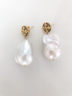 This beautiful earring is the combination of Baroque Pearls and moon stone droplets. This is a more simple version that is less than 2 inches long. Luxury Long Drop Pearl Earrings, Luxury Drop Pearl Earrings, Luxury White Teardrop Earrings, Luxury White Drop Teardrop Earrings, Elegant Handmade Teardrop Linear Earrings, Luxury Teardrop Pearl Drop Earrings, Timeless Teardrop Earrings For Everyday Elegance, Exquisite White Teardrop Pearl Earrings, Luxury Single Pear-shaped Earring