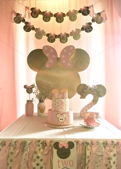 a pink and gold minnie mouse birthday party