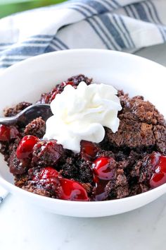 a bowl filled with pudding and whipped cream