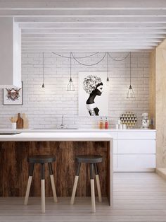 an instagramted photo of a kitchen with white brick walls