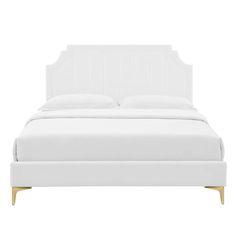 a white bed with gold legs and headboard on it's side, in front of a white background